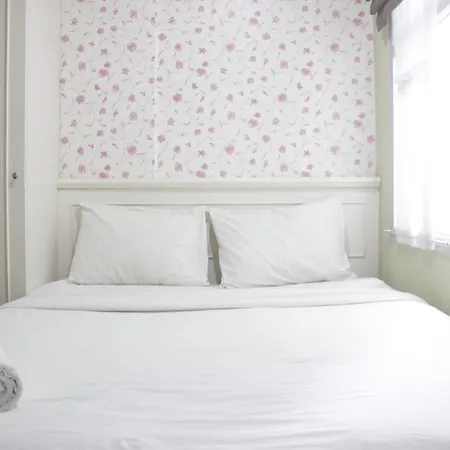 Cozy Studio Apartment At Grand Asia Afrika By Travelio